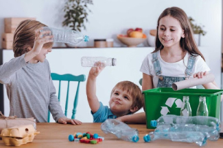 People recycling plastic